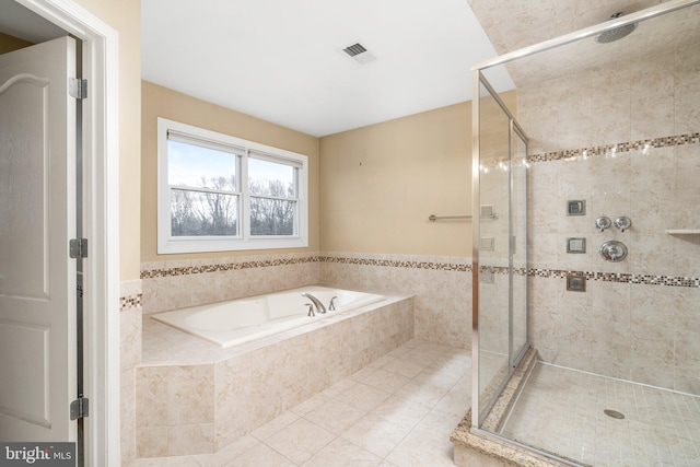 bathroom with plus walk in shower and tile floors