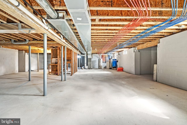 basement featuring water heater