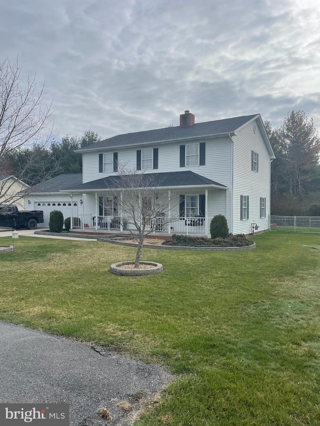 view of front of home featuring a porch and a front lawn