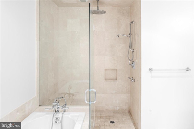 bathroom with independent shower and bath