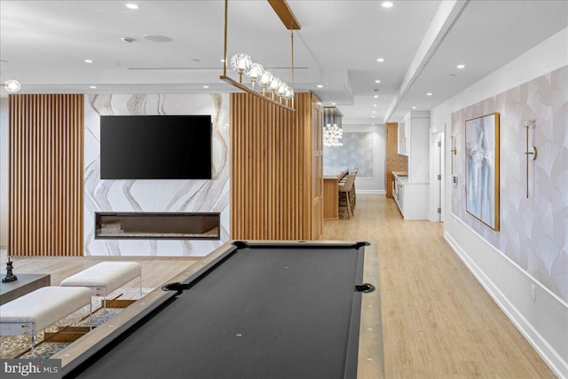 playroom featuring billiards and light hardwood / wood-style flooring