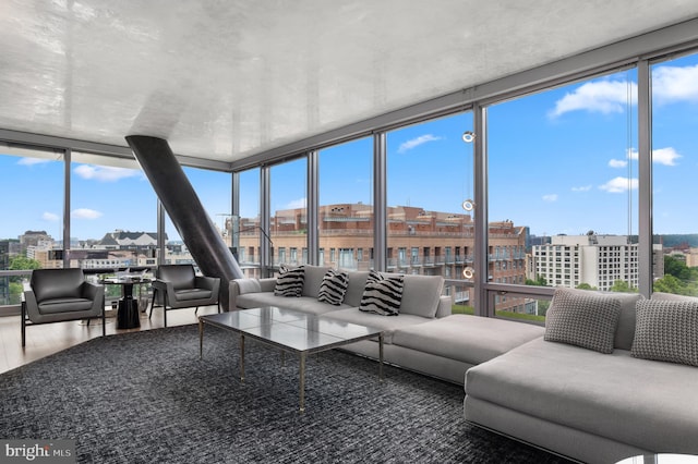 sunroom featuring a wealth of natural light