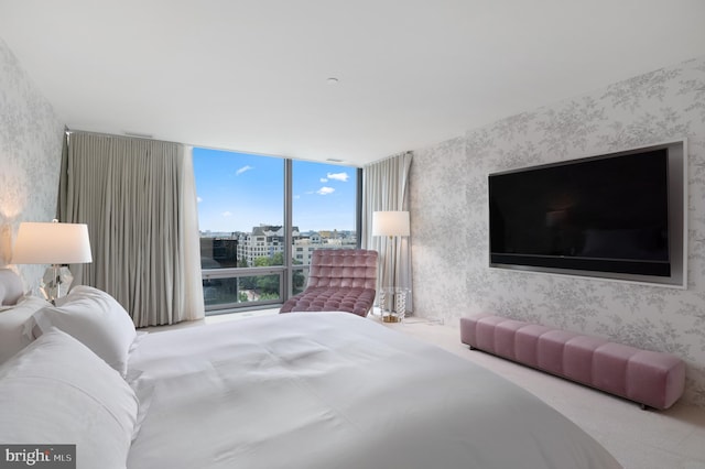 bedroom with a wall of windows