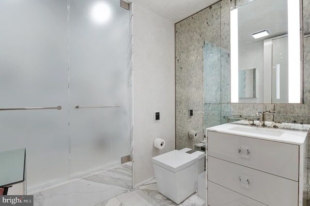 bathroom with tile walls, tile flooring, toilet, and vanity