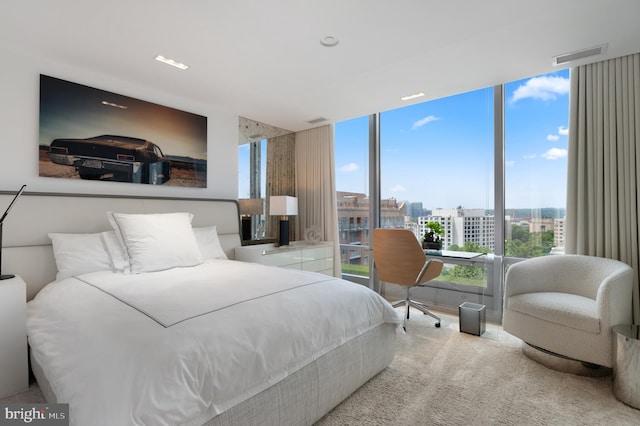 bedroom with a wall of windows