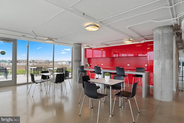 dining room with expansive windows