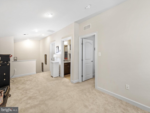 interior space with light colored carpet