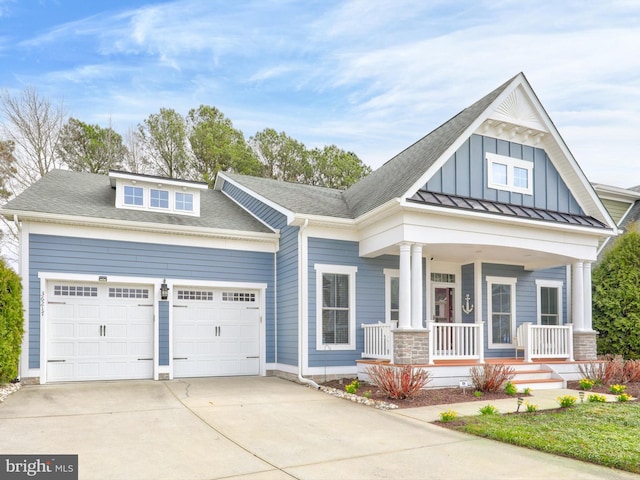 craftsman-style house with covered porch and a garage