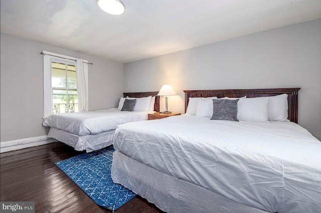 bedroom featuring dark hardwood / wood-style floors