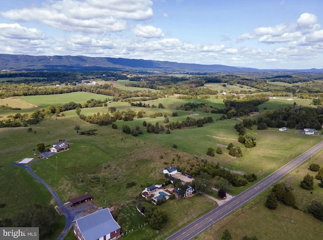 birds eye view of property featuring a rural view and a mountain view