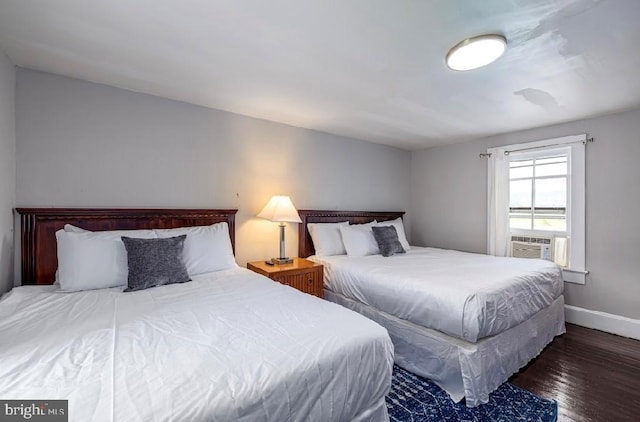 bedroom featuring dark hardwood / wood-style floors