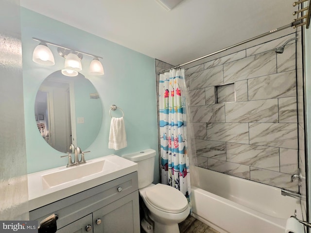 full bathroom featuring toilet, shower / tub combo, vanity, and hardwood / wood-style flooring