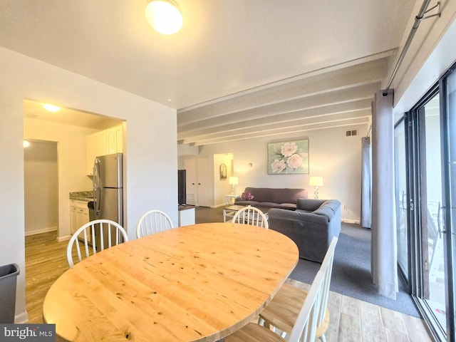 dining room featuring wood-type flooring