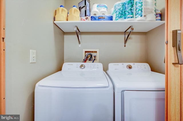 laundry room featuring washer and dryer and washer hookup