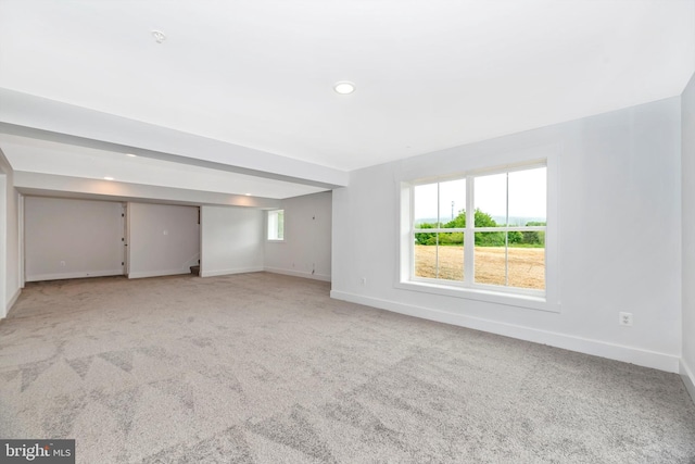 empty room with light colored carpet