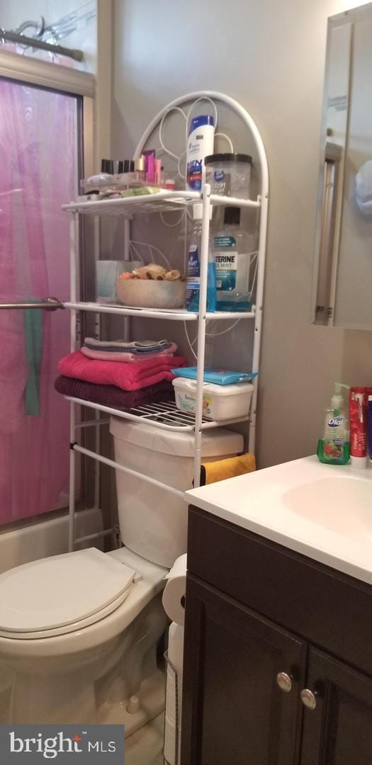 bathroom with vanity and toilet