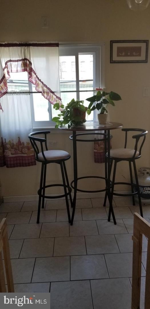 view of tiled dining area