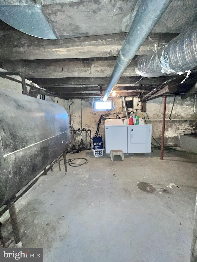 basement featuring separate washer and dryer