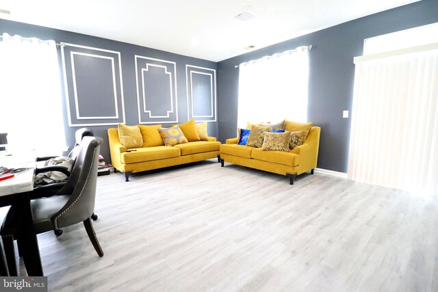 living room featuring light hardwood / wood-style flooring