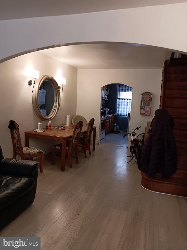 dining space featuring hardwood / wood-style flooring