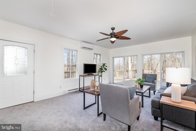 carpeted living room with a baseboard radiator, ceiling fan, a wealth of natural light, and an AC wall unit