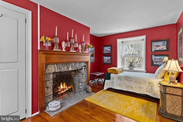 bedroom featuring dark wood-type flooring