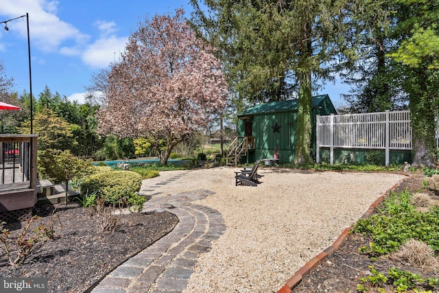 view of yard featuring a wooden deck