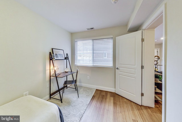 bedroom featuring light hardwood / wood-style floors