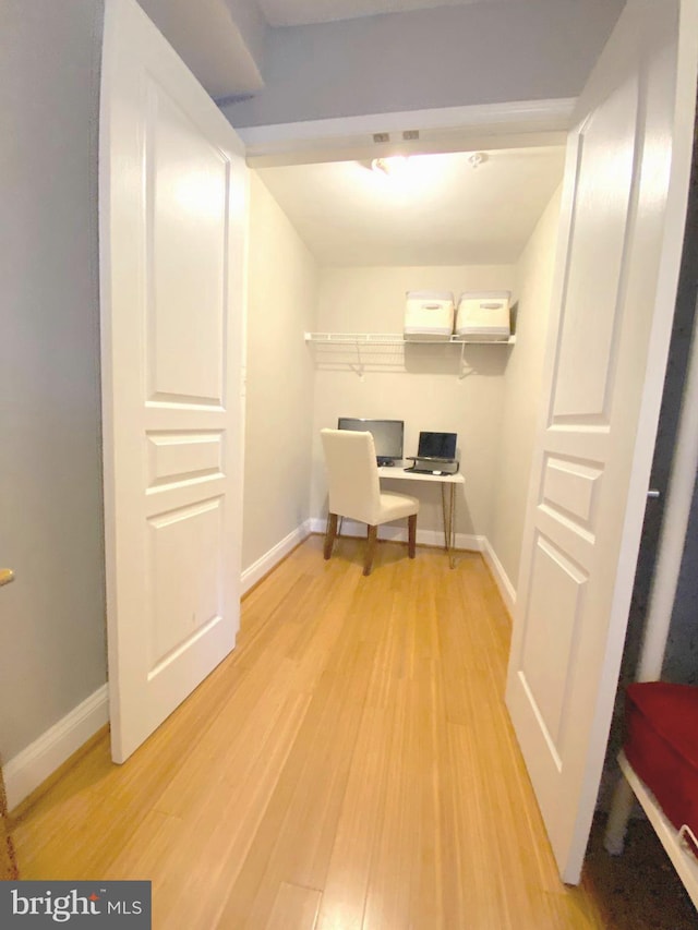 office space with light hardwood / wood-style flooring