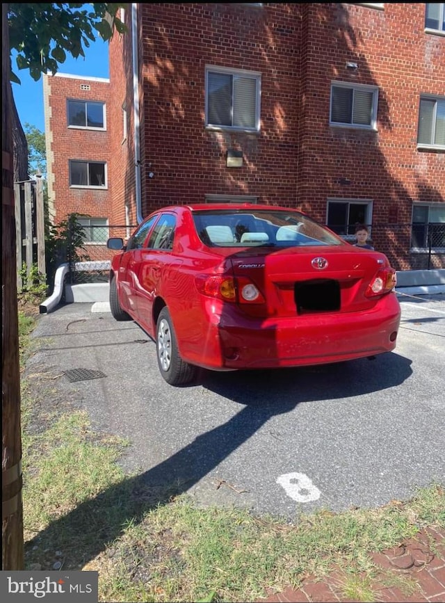 view of parking / parking lot