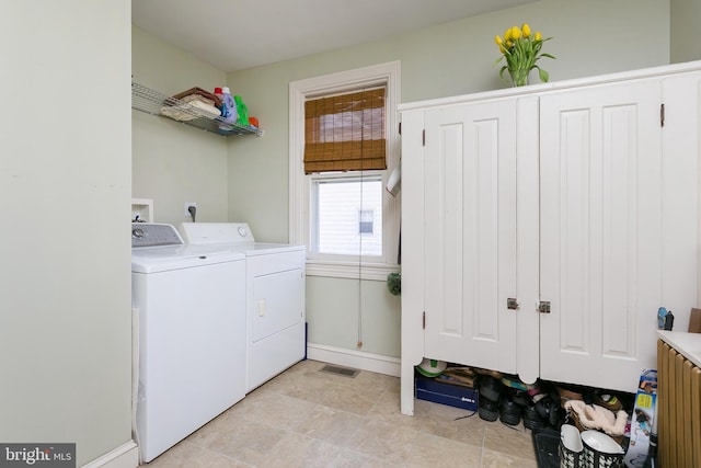 laundry room featuring washer and clothes dryer