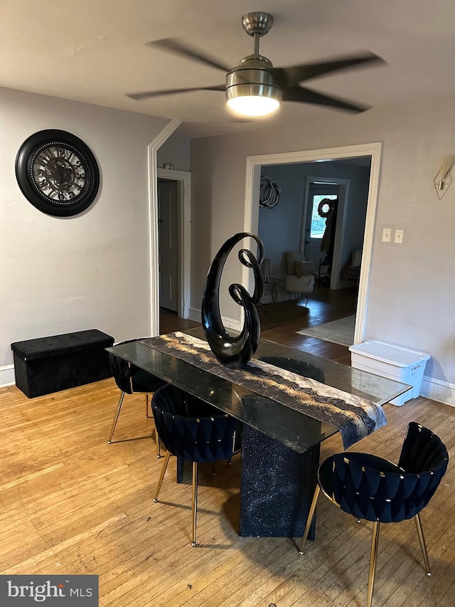 dining room featuring hardwood / wood-style flooring and ceiling fan