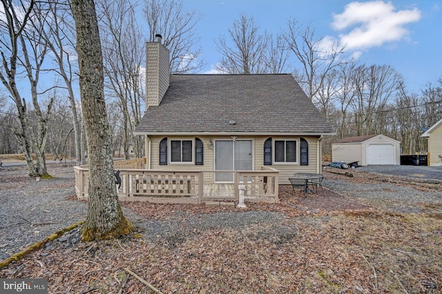 view of front of home featuring an outdoor structure and a garage