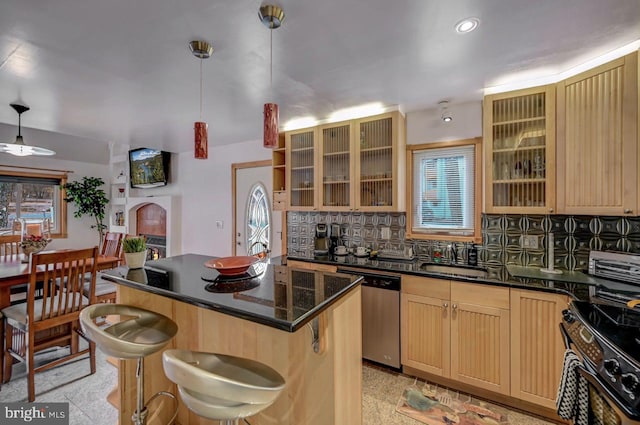 kitchen featuring backsplash, a kitchen island, light tile floors, and decorative light fixtures