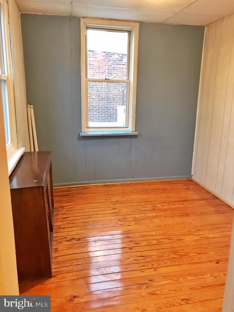 empty room with light wood-type flooring