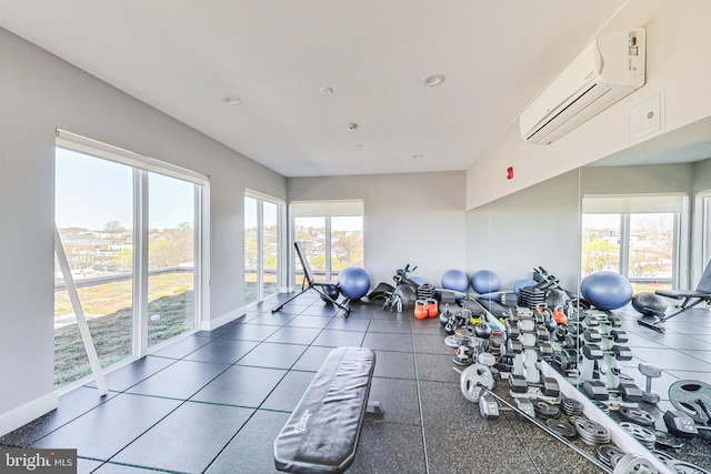 exercise room with an AC wall unit and tile flooring