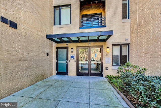 doorway to property featuring french doors