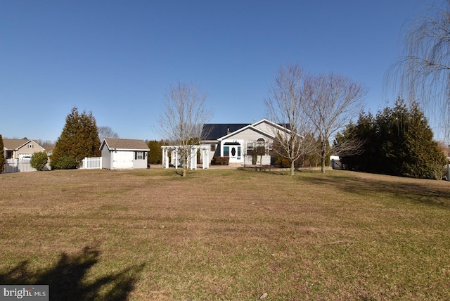 ranch-style home with a front lawn