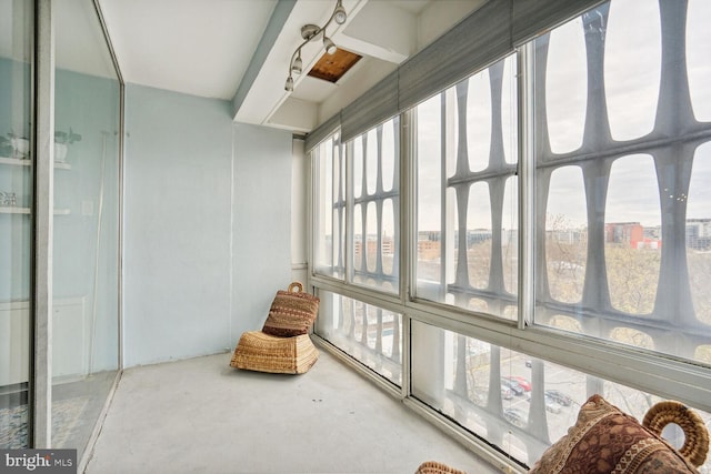 sunroom featuring a healthy amount of sunlight