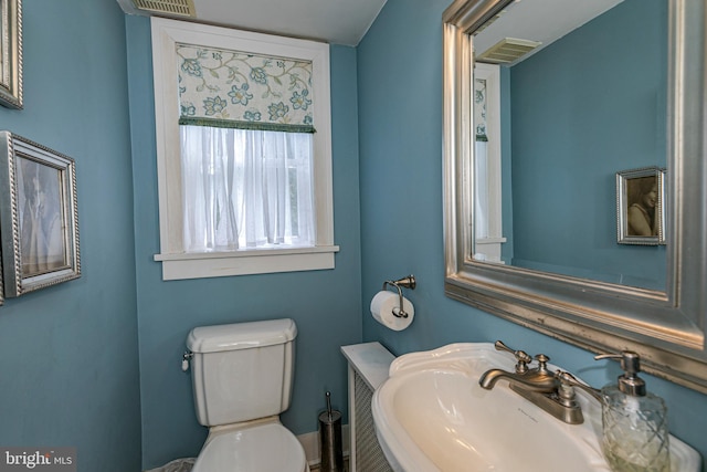 bathroom featuring sink and toilet