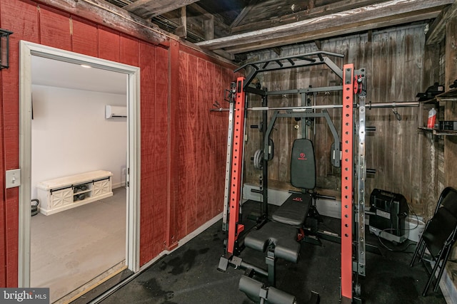 exercise room with a wall unit AC