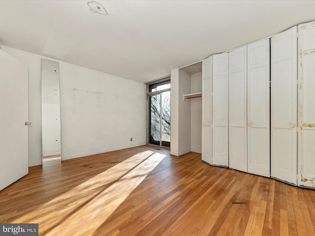 unfurnished bedroom featuring light hardwood / wood-style flooring