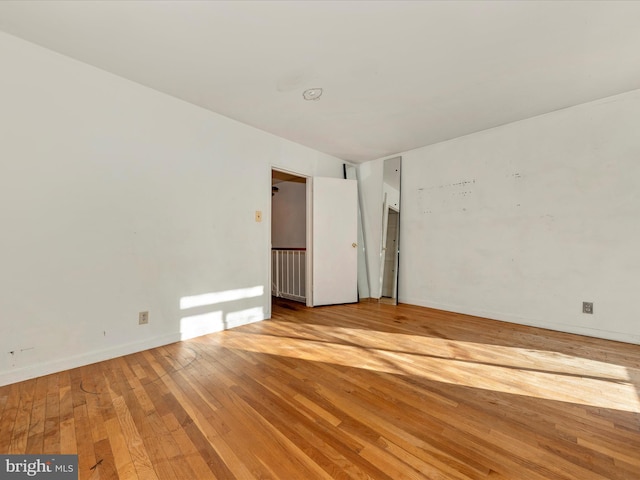 empty room with light wood-type flooring