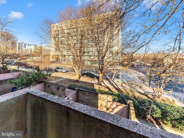 view of patio featuring a balcony