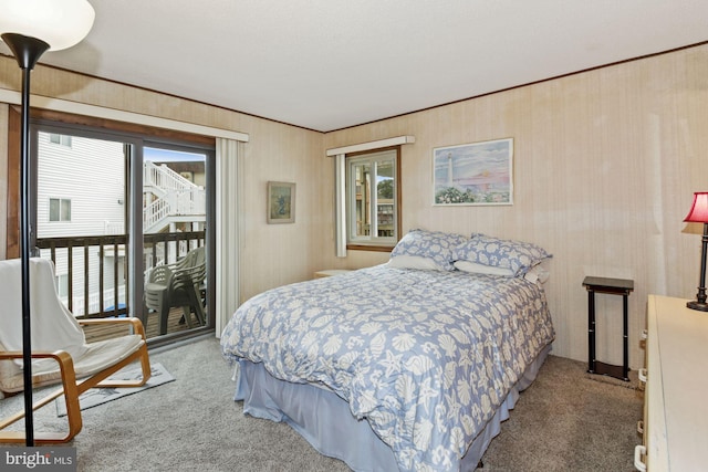 bedroom featuring light colored carpet and access to exterior