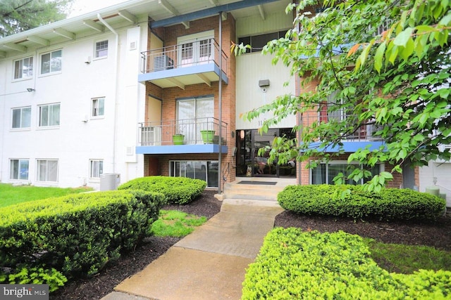 view of property featuring central air condition unit