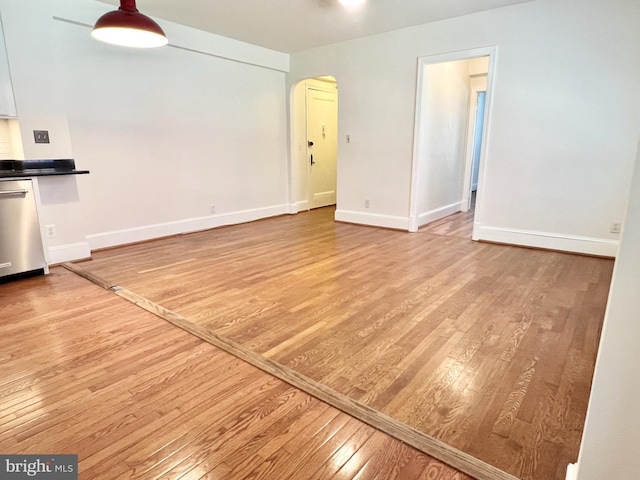 unfurnished living room featuring light hardwood / wood-style floors