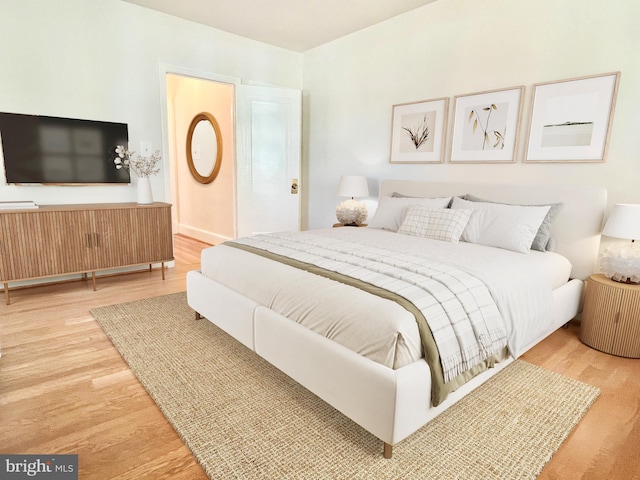 bedroom featuring hardwood / wood-style flooring