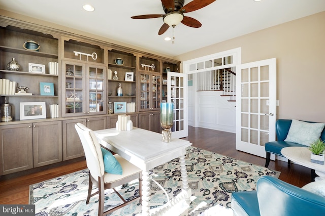 office space with french doors, dark wood-type flooring, and ceiling fan