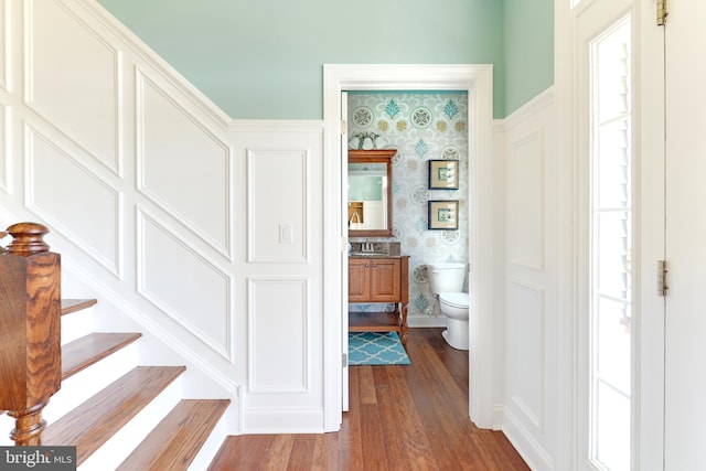 staircase featuring dark wood-type flooring